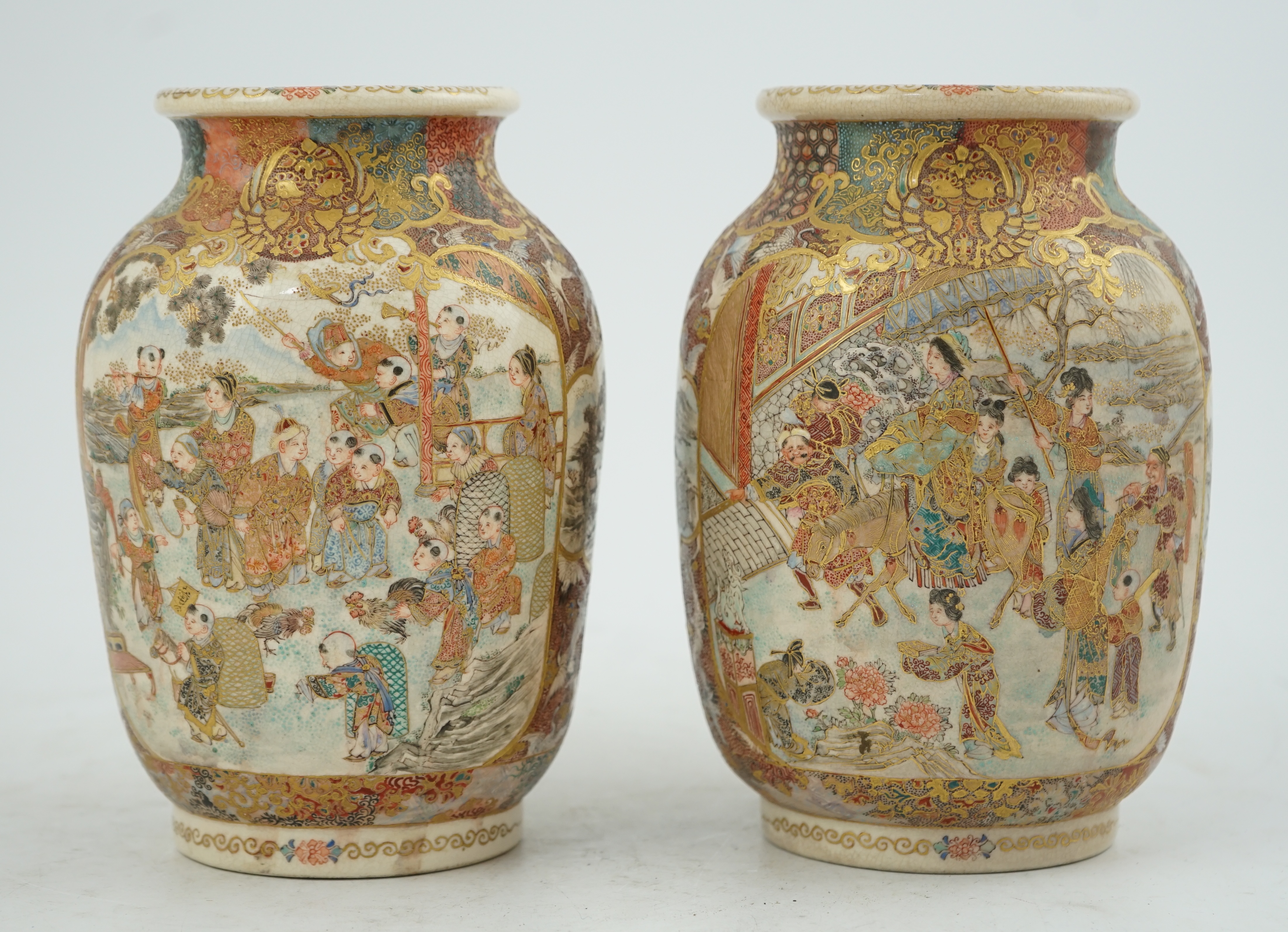 A pair of Japanese Satsuma 'boys' ovoid vases, Meiji period